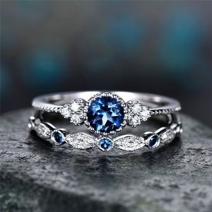 New White Gold Plated Copper Ring Faux Blue Sapphire set Zircon Crystal Bling